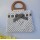 2021 Fashion Knitted Hollow Girl Handbag with Bowknot Square Straw Handbag