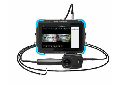 How does the industrial endoscope obtain real-time images of the detected object?