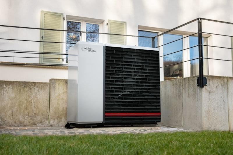 EVI air source heat pump in front of a house