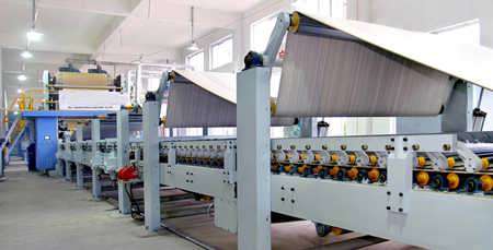 Application of heating compound machine in corrugated board production line