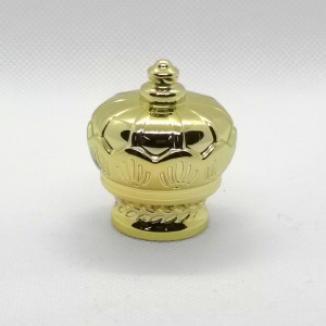Tapas de botellas de corona de zamac de oro envases de perfume para botellas de vidrio China a la venta