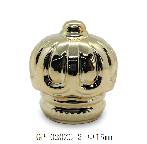 Golden plated zamac perfume cap wholesale | crown shape perfume cap | zinc alloy cap | zamak cap for glass bottle | GP Bottles Manufacturing