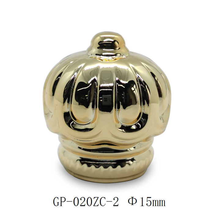 Golden plated zamac perfume cap wholesale | crown shape perfume cap | zinc alloy cap | zamak cap for glass bottle | GP Bottles Manufacturing