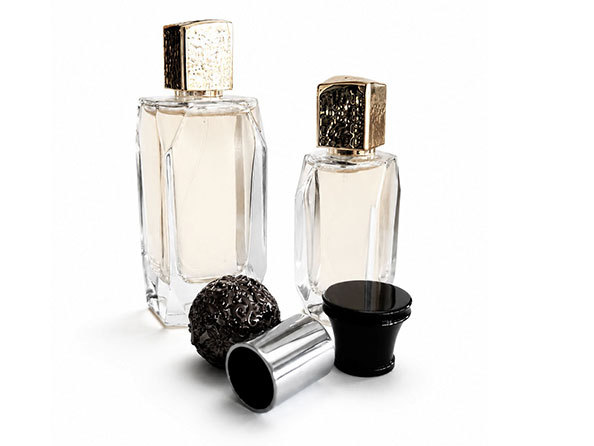 Custom perfume bottles wholesale displayed on a cosmetic retail shelf