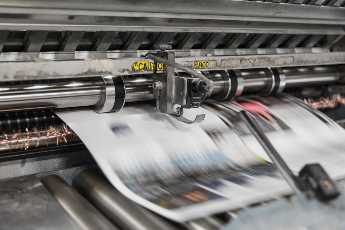 Offset printing press producing printed sheets for perfume packaging