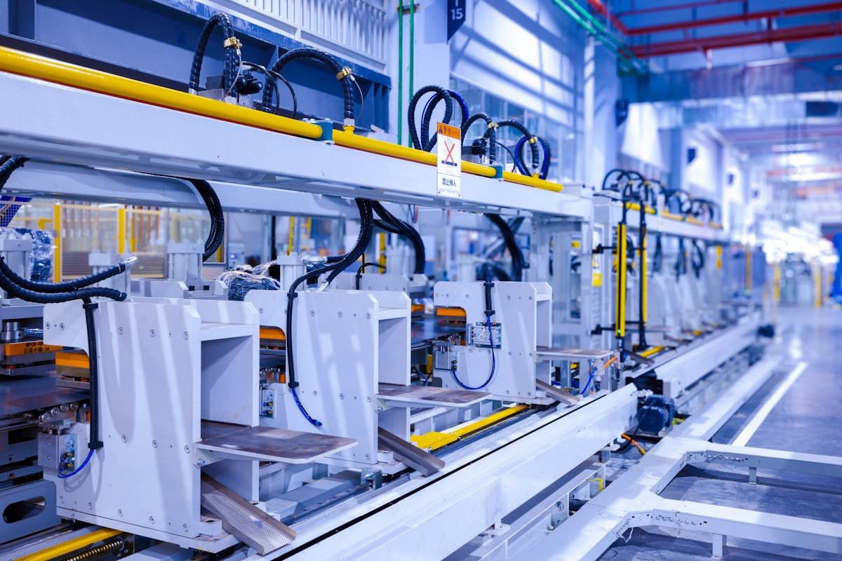 Wide view of the perfume packaging plant showing multiple production machines
