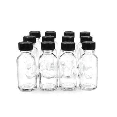 Custom Clear Boston Round Glass Bottles | 1 oz Small Glass Bottles with Black Poly Seal Cone Cap