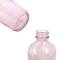 Custom Pink Boston Round Glass Bottles | 4 oz Coated Glass Bottles Bulk with Cap