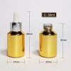 Flacons compte-gouttes en verre doré de 30 ml personnalisés | Bouteilles d'huile essentielle de pente de cylindre avec compte-gouttes doré