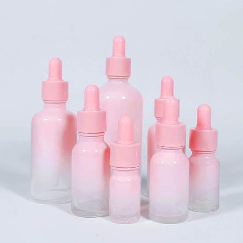 Frascos cuentagotas de vidrio de aceite esencial Euro personalizados | Botellas redondas de suero rosa degradado para el cuidado de la piel