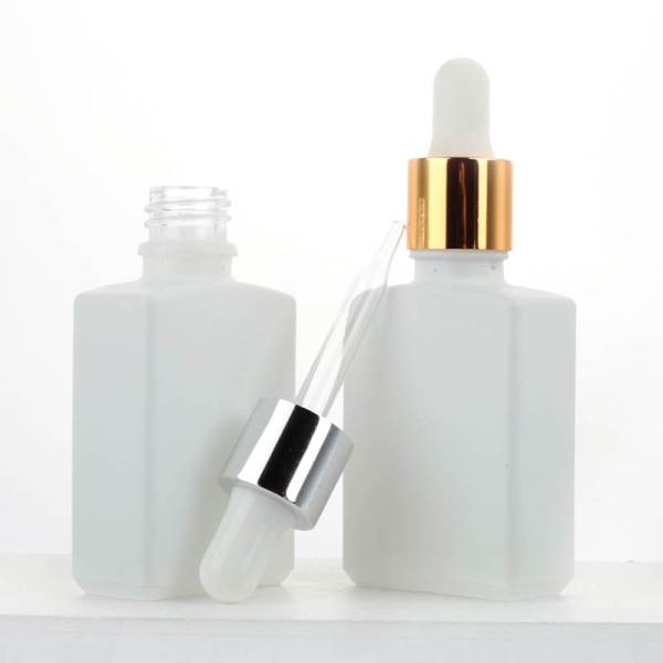 Frascos cuentagotas cuadrados de vidrio de 1 oz Venta al por mayor | Botellas de jugo E blanco mate con cuentagotas