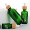 Flacons compte-gouttes en verre personnalisés | Bouteilles d'huiles essentielles Euro vertes avec compte-gouttes en bambou