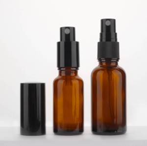 Botellas de spray de aceite esencial de vidrio ámbar personalizadas con pulverizador de niebla acanalado negro