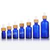 Custom Euro Blue Glass Dropper Bottles for Essential Oils with Bamboo Dropper