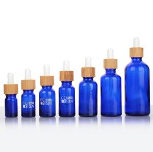 Custom Euro Blue Glass Dropper Bottles for Essential Oils with Bamboo Dropper