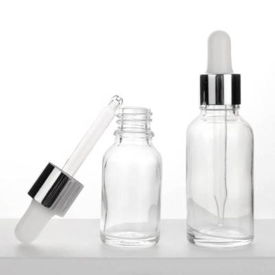 Custom Euro Clear Glass Essential Oil Bottles | Hair Oil Bottles with Slivery Dropper