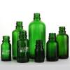 Bouteilles de pulvérisation de pompe en verre vert personnalisé pour huiles essentielles, toner