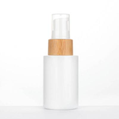 Wholesale 30ml Glass Makeup Cosmetic Oil Pump Bottles with Bamboo Pump