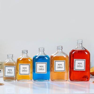 Wholesale Flat Cold Brew Coffee Glass Bottles | Fruit Glass Juice Bottles with Lids