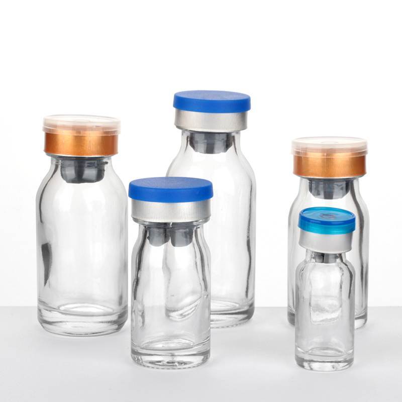 clear small glass vials