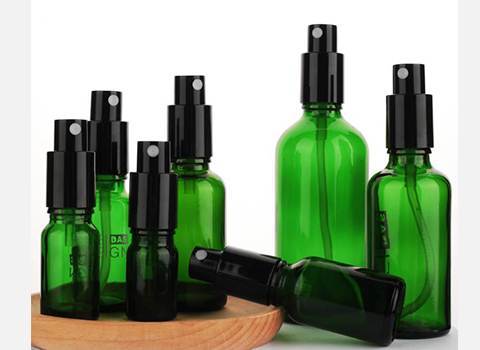 wholesale green glass spray bottle for essential oils