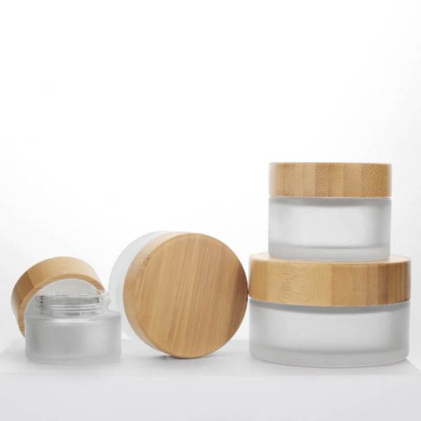 Wholesale Frosted Glass Cosmetic Jars with wooden lids | Custom Glass Cosmetic Containers