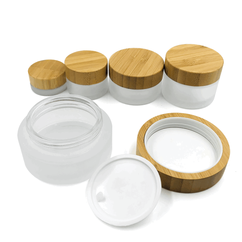 Wholesale Frosted Glass Cosmetic Jars with wooden lids | Custom Glass Cosmetic Containers