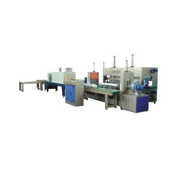 AUTOMATIC FABRIC ROLL PACKING MACHINE ( LINEAR FABRIC INSPECTION AND PACKING LINE )