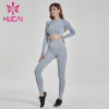 Wholesale yoga clothes long sleeve tight knit fitness suit sexy leak belly