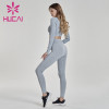 Wholesale yoga clothes long sleeve tight knit fitness suit sexy leak belly