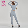 Wholesale yoga clothes long sleeve tight knit fitness suit sexy leak belly