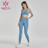 Light blue fitness suit back cross bra with hip lifting pants private label fitness apparel manufacturers