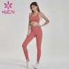 Brick red fitness suit irregular bra fitness suit usa sportswear manufacturers