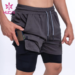custom gym shorts breathable phone pocket soft cotton men pants sports apparel suppliers
