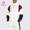oem new design multi colors fashion splicing sports tracksuits men china clothes factory