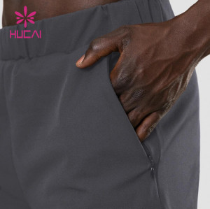 HUCAI Special Design Gym Wear with Zippers Men Woven Joggers Sportswear Manufacturing Companies