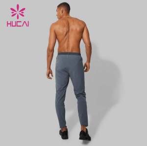 HUCAI OEM ODM Customized Logo Men Woven Joggers Private Label Fitness Clothing