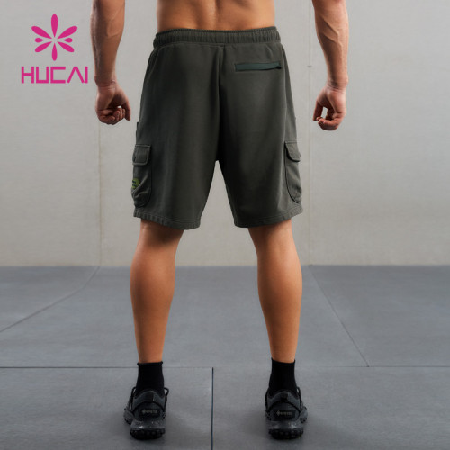 HUCAI Custom Washed Workout Shorts Silicone Logo 3D Pocket Sports Wear Supplier