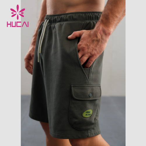 HUCAI Custom Washed Workout Shorts Silicone Logo 3D Pocket Sports Wear Supplier