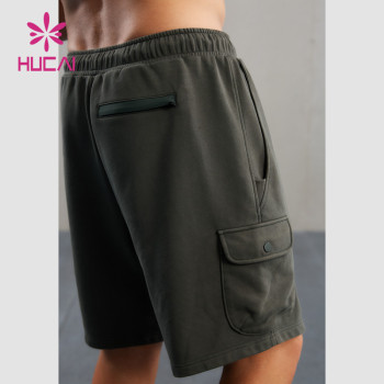 HUCAI Custom Washed Workout Shorts Silicone Logo 3D Pocket Sports Wear Supplier