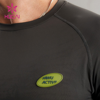 HUCAI ODM Sports Long-sleeved Thumb Hole Round Neck Quick Dry T Shirts Factory