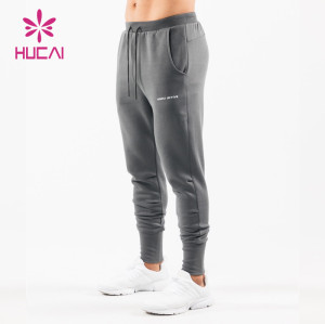 HUCAI Hot Sale Gym Sweatpants Pure Color Fabric Screen Printing Drawstring Joggers Supplier