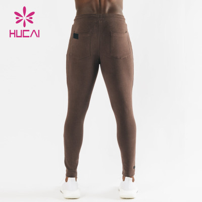 HUCAI Hot Sale Gym Sweatpants Fit With Pockets Silicone Printing Drawstring Joggers Supplier