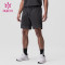 HUCAI Custom Fadded Colors Mens Drawstring Sports Shorts With Zipper Pocket Manufacturer