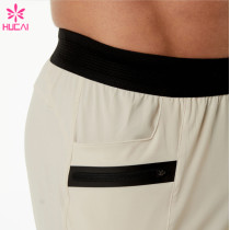 HUCAI ODM Gym Sweatpants Zipper Pockets Screen Printing Drawstring Joggers Manufacturer