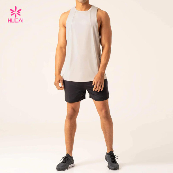HUCAI Private Label Tank Top New Design Low Cut Armholes For Freedom Of Movement Vest Gym Wear Factory
