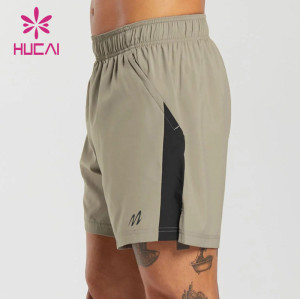 HUCAI ODM Fitness Pocket Shorts Quick-Drying Fabric Contrast Color Workoutwear