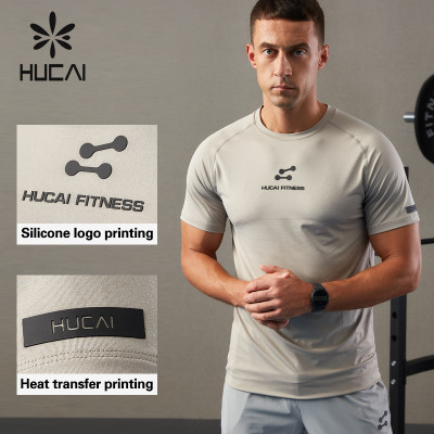 HUCAI OEM Mens Gym Shirts Drop Shoulder Design Silicone LOGO Gymwear Factory