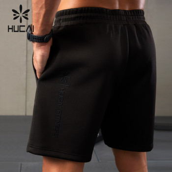 HUCAI Custom Mens Shorts Beaded Fabric Silicone 3D Logo Drawstring Gymwear ODM