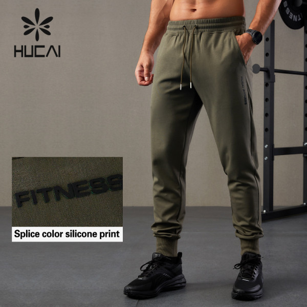 HUCAI OEM Mens Sports Joggers 3D Logo Heat Transfer Sweat Pants Factory China